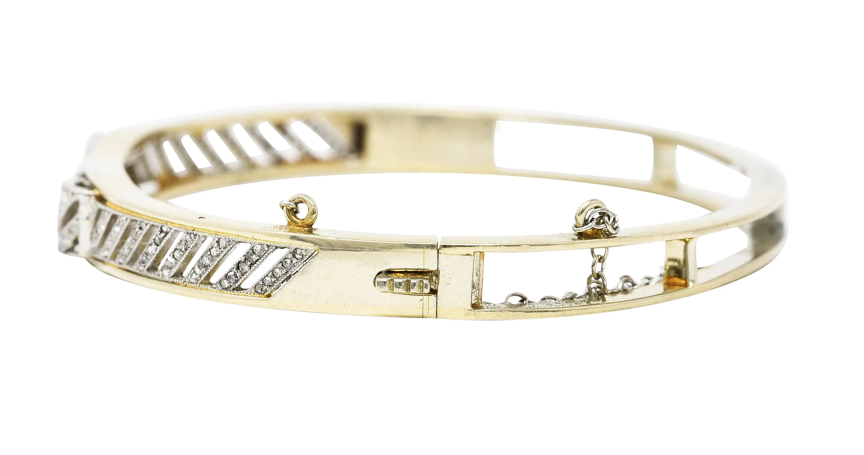 Edwardian 1.04 CTW French Cut Diamond Platinum-Topped 14 Karat Yellow Gold Bow Antique Bangle Bracelet