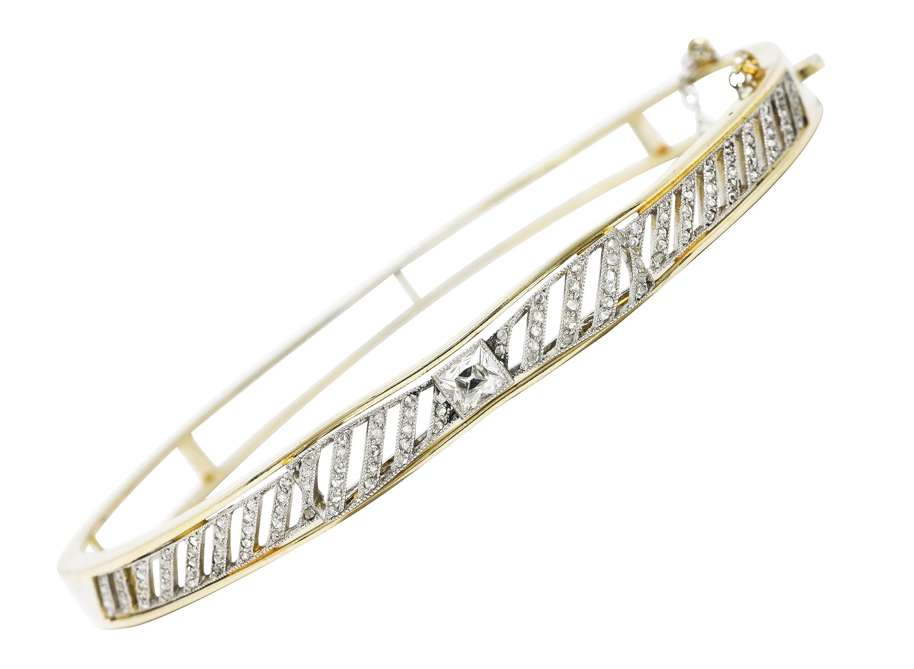 Edwardian 1.04 CTW French Cut Diamond Platinum-Topped 14 Karat Yellow Gold Bow Antique Bangle Bracelet